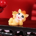 Cute yellow resin horse figurine holding a gold ingot for Chinese New Year decor - Lying Lucky Horse with Ingot