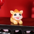 Cute yellow resin zodiac horse figurine with orange hair and blushing cheeks - Prostrating Horse