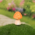 Miniature resin mushroom figurine with orange cap and white dots for garden decor - Small Round Mushroom