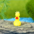 Miniature resin giraffe figurine holding a red rose for DIY micro landscape garden decor - Yellow Figure with Flower (T)