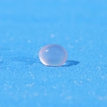 Pale pink purple resin pebble fish tank decoration on blue glittering sand - Light Pinkish Purple Translucent Bead (Style O)