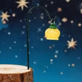 Yellow luminous bellflower miniature on black stand with starry blue background - Glow Orange Lantern With Iron Hook