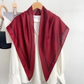 Elegant wine red silk scarf with black striped edges draped over a white shirt - 155x95x63cm / Red