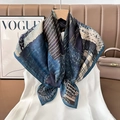 Detail of silk-texture square scarf with paisley and plaid prints on a stylish hanger - Color 12