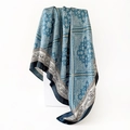 Detailed view of teal blue silk scarf with paisley patterns and dark blue borders - 90x90cm (D9496) / Blue