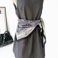 Detail of vintage paisley print silk scarf styled as a decorative belt accessory - Black Paisley