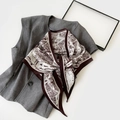 Detailed view of Indonesian style beach scarf with vintage map print on soft silk fabric - 140x85x63cm / Red