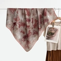 Dusty rose retro silk scarf with carriage print and Courage lettering hanging on a rack - Red Brown Carriage