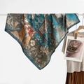 Vintage navy and ginger floral silk scarf with baroque patterns on a clothing rack - Gold Blue Floral