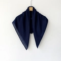 Deep blue herringbone cotton hijab scarf with frayed edges hanging on a wooden hanger - 70*70cm / Navy Blue