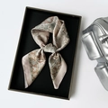Elegant earth-tone paisley silk scarf in vintage patterns displayed in a premium gift box - Square / Brown