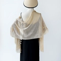 Elegant champagne gold metallic shawl with long tassels displayed on a mannequin - Champagne