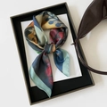 Close-up of floral print satin scarf tied in a bow with vintage oil painting pattern - 70x70cm / Leaf