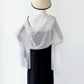 Elegant silver metallic knit shawl with long fringe tassels for formal evening wear - White