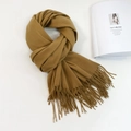 Detail of soft caramel faux cashmere scarf with long tassels and stylish magazine setup - 74.8*27.5inch / Camel