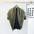 Detailed view of dark green pleated silk scarf on wood rod with black knit shirt - Pleating / Army Green