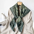 Dark green paisley print scarf styled on a beige blazer for a sophisticated business look - 105*105cm / Algae Vine Green