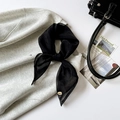 Minimalist black sheer organza square scarf tied in a bow with gold metal logo tag - 64x64cm / Black