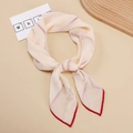 Elegant ivory scarf with thin purple stripes and contrasting red edges tied in a knot - Beige Apricot