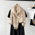 Detail of floral linen-cotton shawl draped over a black dress with fine brown hem stitch - Khaki (M8906)