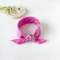 Close-up of hot pink paisley bandana tied as a stylish headband on white background - 50cm x 50cm / Pink