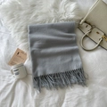 Elegant grey cashmere-feel scarf with long tassels folded on a soft white background - Light Gray (LM01-03)