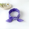 Close-up of a purple cotton paisley bandana tied into a bow shape on a white background - 50cm x 50cm / Purple
