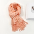 Pale orange cashmere-like shawl with long fringes and soft texture in a stylish flat lay - 74.8*27.5inch / Bright Pink