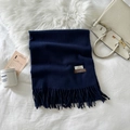 Deep blue cashmere-feel wool scarf with fringes on a cozy minimalist winter background - Navy Blue