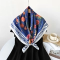 Navy blue silk scarf with orange tulips and red daisies on a wooden hanger - Blue Floral