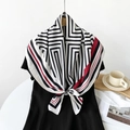 Black and white geometric square scarf with red edges styled on a black dress - 90*90cm / Black Red