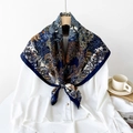 Navy and gold floral paisley 90cm silk square scarf knotted on a white shirt - Dark Blue Floral Print