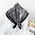Elegant black and white city map printed silk scarf tied on a white shirt collar - Black White Map