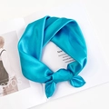Peacock blue satin square scarf tied in a stylish ring knot on a fashion magazine - Sky Blue
