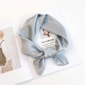 Elegant 60cm light blue satin square silk scarf in a stylish knotted display - Light Gray