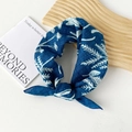 Navy blue cotton silk scarf with white floral leaf print in a stylish knotted design - Leaf Blue