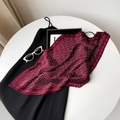 Pleated wine red scarf with white floral print styled on a black dress and white table - Wine Red Paisley