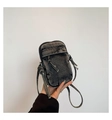 Detail shot of distressed dark grey denim mini crossbody bag with drawstring design - One Size / Black