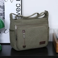 Army green canvas messenger bag for men featuring multiple zipper pockets and wide strap - Green
