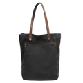 Large black canvas tote bag with brown leather handles and front pocket storage - Black