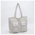 Detail of canvas tote bag featuring dual front pockets with metallic silver buckles - Off-White