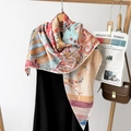 Detail of luxury silk scarf with colorful hot air balloon print on a wooden hanger - Floral Pattern Red