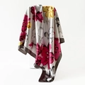 Detail of floral printed satin scarf featuring vibrant pink and yellow hand-painted flowers - Gray