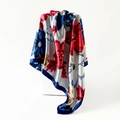 Detailed shot of an elegant 90cm silk-satin scarf featuring abstract floral prints on a white pedestal - Blue