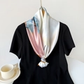 Detail of elegant ginkgo leaf print satin scarf tied on a black short sleeve dress - 90cmx90cm / Pink