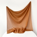 Detailed close-up of caramel chiffon headscarf with fine texture and subtle drape - 95x95cm / Amber