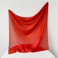 Close-up of lightweight solid red silk scarf showing smooth texture and rolled edges - 95x95cm / Red