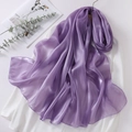 Detail of purple organza scarf with pearlescent sheen and fine edge stitching over a shirt - Purple