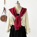 Detail showing knit texture of the burgundy shawl over a cream shirt and pleated skirt - 102*46cm / Red