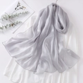 Detail of elegant silver grey organza scarf with glossy texture and fine edge stitching - Silver Grey
